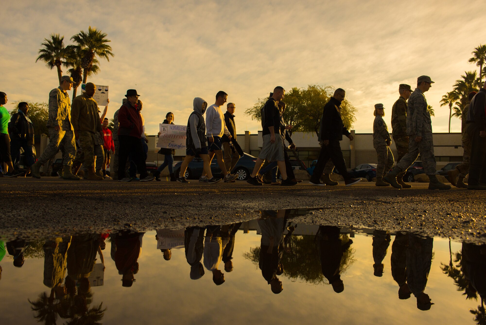 Airmen assigned to the 56th Fighter Wing participate in a Martin Luther King Jr. Day remembrance march at Luke Air Force Base, Ariz., Jan. 18, 2019. Thunderbolts organized the special observance march to take place three days prior to the federal holiday celebrated Jan. 21. (U.S. Air Force photo by Senior Airman Caleb Worpel)