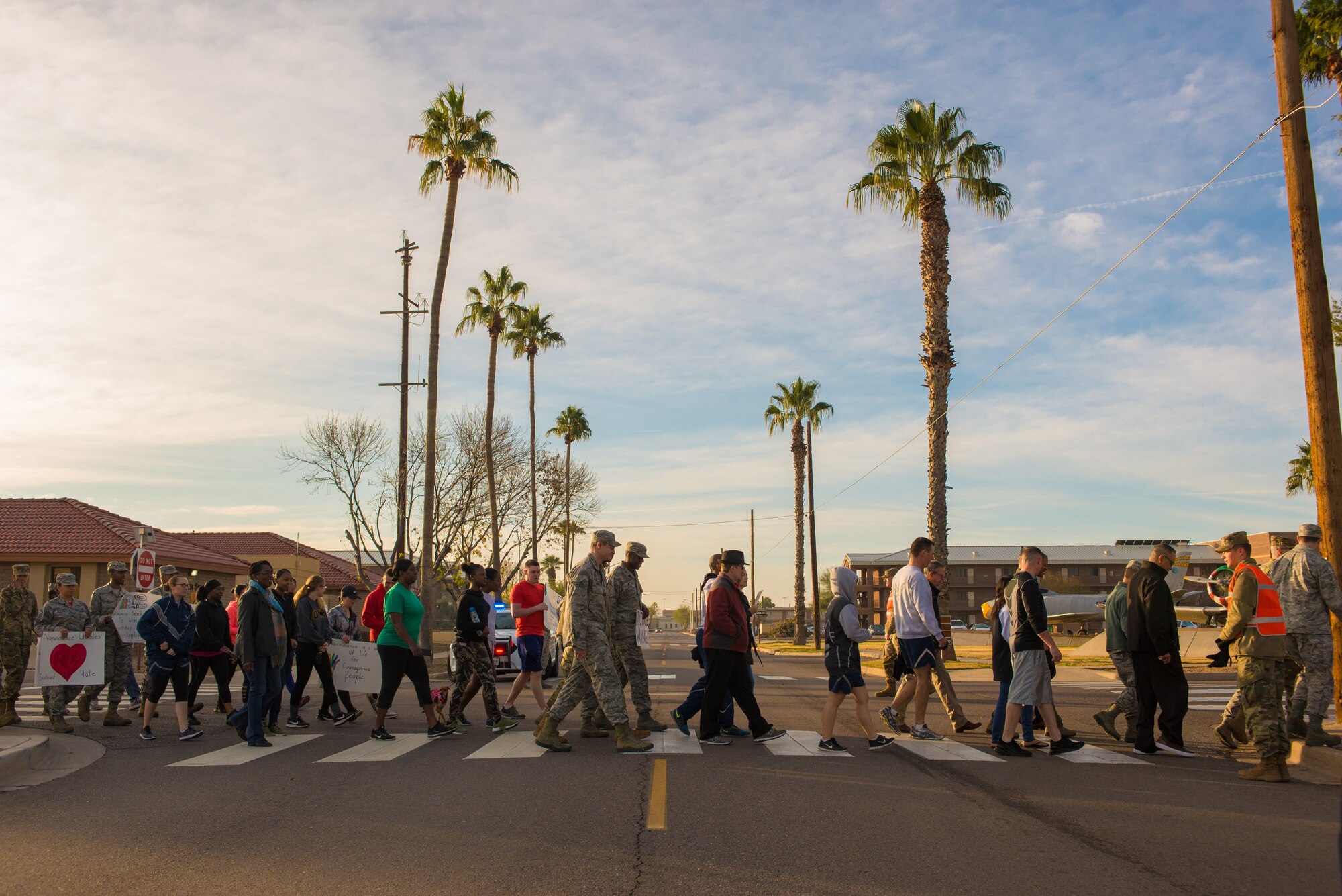 Airmen assigned to the 56th Fighter Wing participate in a Martin Luther King Jr. Day remembrance march at Luke Air Force Base, Ariz., Jan. 18, 2019. The march was a re-enactment of three protest marches which took place during the Civil Rights Movement in Selma, Alabama, 1965. (U.S. Air Force photo by Senior Airman Caleb Worpel)