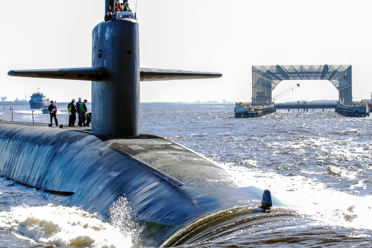 A submarine travels in water.