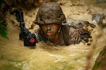 A U.S. Marine officer candidate of the Officer Candidates School participates in the OCS combat course at Marine Corps Base Quantico.