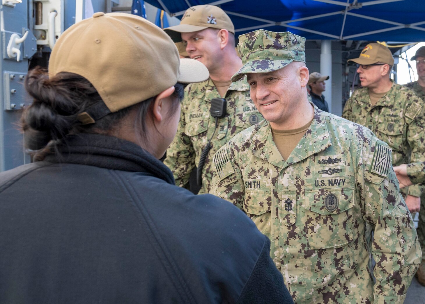 YOKOSUKA, Japan (Jan. 18, 2019) Master Chief Petty Officer of the Navy (MCPON) Russell Smith shakes hands with a Sailor, assigned to the guided-missile cruiser USS Antietam (CG 54), in Yokosuka, Japan before an all hands call. MCPON is the highest enlisted leader in the Navy and was sent to collect Sailors' and enlisted leaders' insights on their challenges in the 7th Fleet to maintain a war fighting readiness. This is the MCPON's first visit to Commander, Fleet Activities Yokosuka as the U.S. Navy's 15th Master Chief Petty Officer of the Navy.