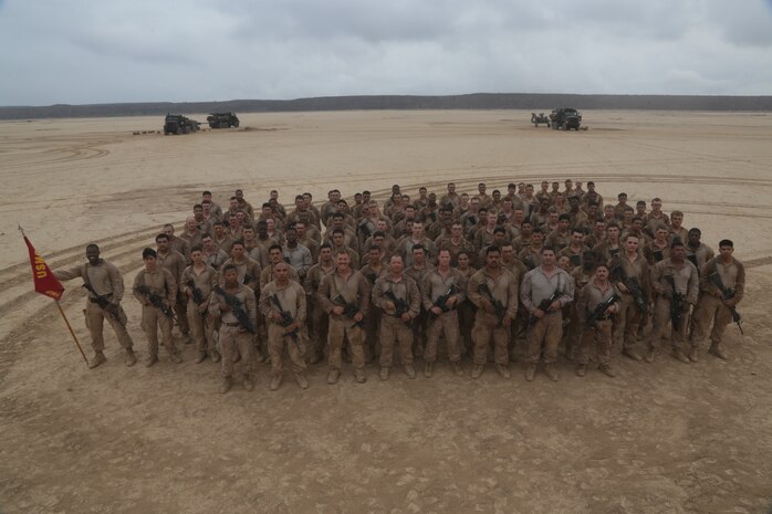 U.S. Marines with Bravo Battery, Battalion Landing Team 3/1, 13th Marine Expeditionary Unit, pose for a photo in Djibouti during Theater Amphibious Combat Rehearsal, September 13, 2018.