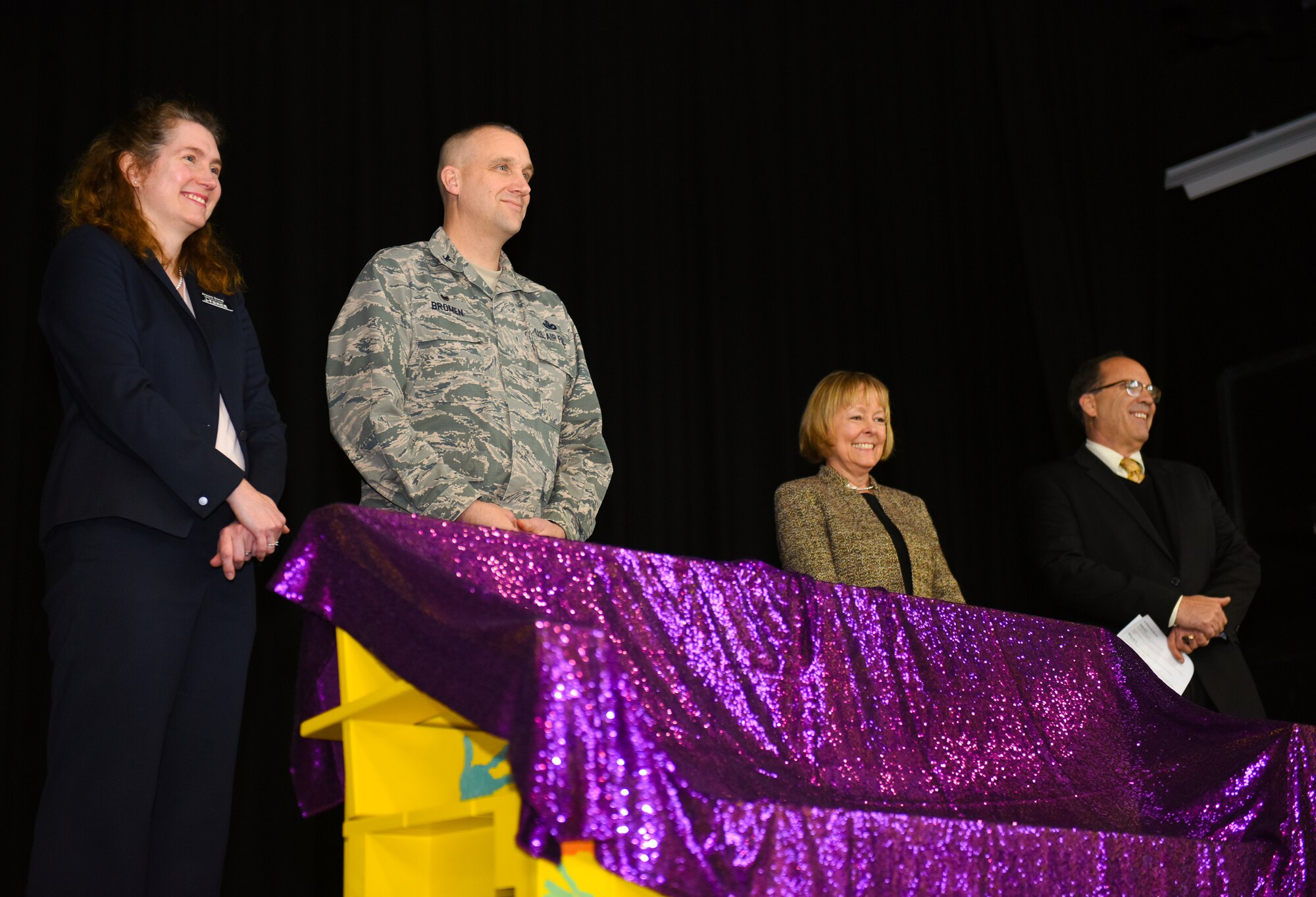 U.S. Air Force Col. Christopher Bromen prepares to unviel the new Buddy Bench at RAF Alconbury, United Kingdom, Jan.15, 2019. The new Buddy Bench has been placed at the base elementary school to promote kindness and healthy relationships within the school system. (U.S. Air Force photo by Airman 1st Class Jennifer Zima)