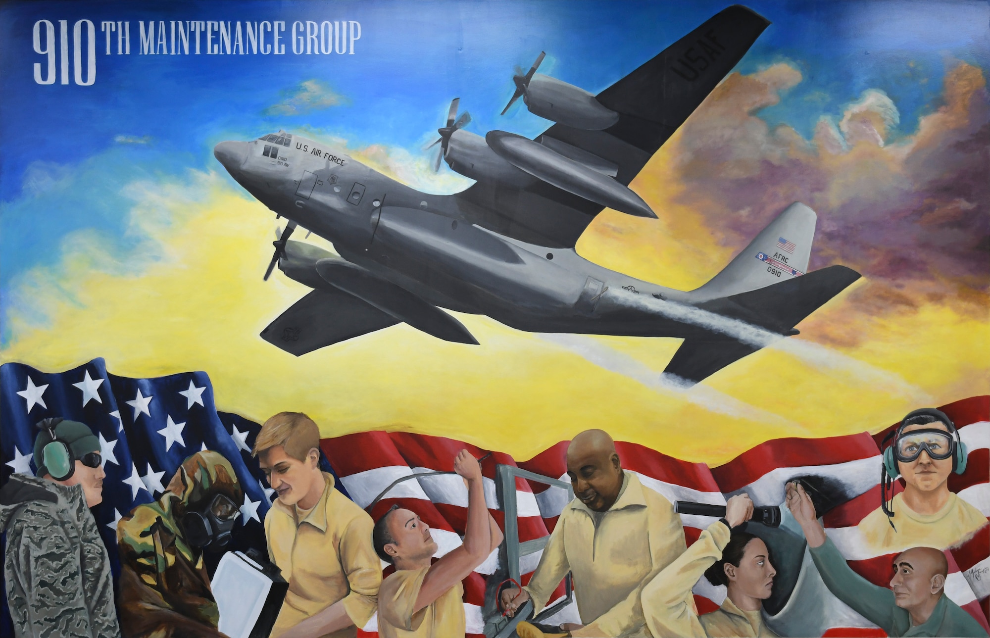 A mural painted by Tech. Sgt. Marlene Scarpino,  an aircraft maintenance specialist assigned to the 910th Maintenance Squadron, portrays the 910th Maintenance Squadron’s role in the success of the wing’s C-130 flying missions.