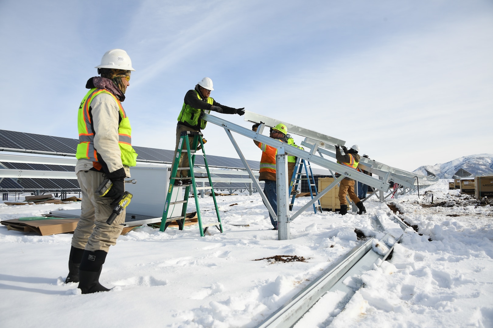 A construction crew works on the new solar array being installed at Hill Air Force Base, Utah, Jan. 9, 2018.