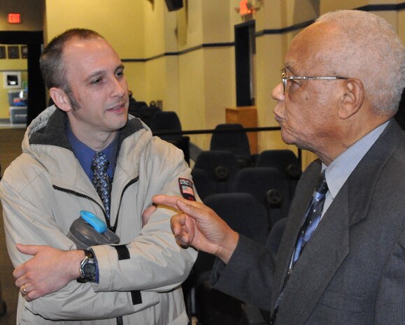 IMAGE DAHLGREN, Va. (Jan. 15, 2019) – Martin Luther King Jr. Observance keynote speaker Frank White speaks with an observance attendee after his speech.