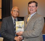 IMAGE: DAHLGREN, Va. (Jan. 15, 2019) – Chuck Campbell, Naval Surface Warfare Center Dahlgren Division Chief of Staff, presents the Dahlgren history book, "The Sound of Freedom," to Frank White in appreciation of his keynote speech at the command’s Martin Luther King Jr. Observance.