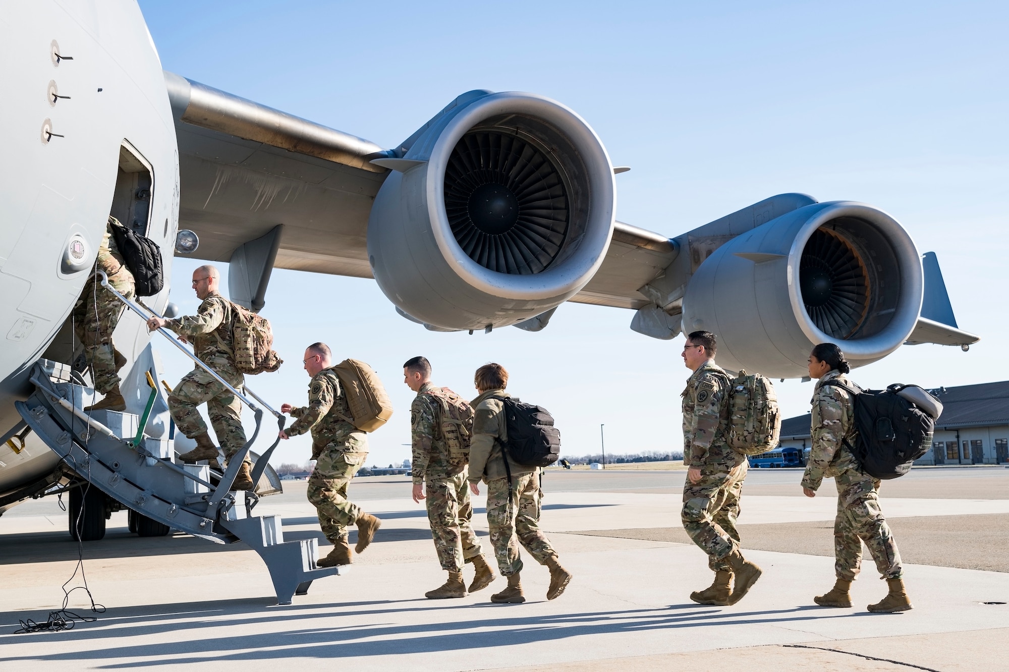 Personnel from the Delaware National Guard's 31st Civil Support Team, Weapons of Mass Destruction headquartered in Smyrna, Del., board a C-17 Globemaster III Jan. 11, 2019, at Dover Air Force Base, Del. Five vehicles and team members were being airlifted to Florida to support the Florida National Guard during a large-scale training exercise Jan. 14-18. The 31st CST maintains the capability to mitigate the consequences of any WMD or Nuclear, Biological, and Chemical event, whether natural or man-made. They are experts in WMD effects and NBC defense operations. The C-17 was from the 105th Airlift Wing, Stewart Air National Guard Base, Newburgh, N.Y., supported by a 137th Airlift Squadron aircrew. (U.S. Air Force photo by Roland Balik)