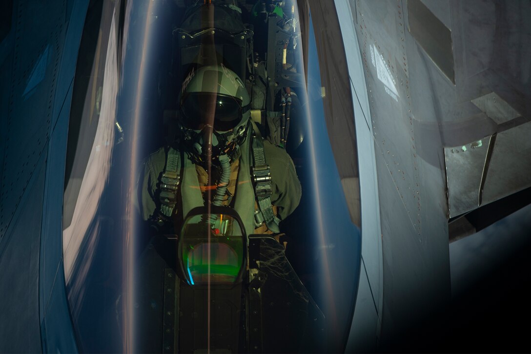 An Air Force F-22 Raptor participates in an aerial refueling