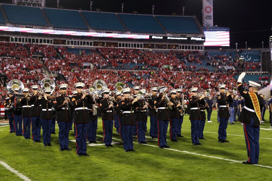 Marines with the Parris Island Marine Band perform during the pre-game show of the TaxSlayer Gator Bowl, Dec. 31, 2018, at TIAA Bank Field in Jacksonville, Florida. The band played before the fans of Texas A&M University and North Carolina State University. (U.S. Marine Corps Photo by Cpl. Mike Hernandez)