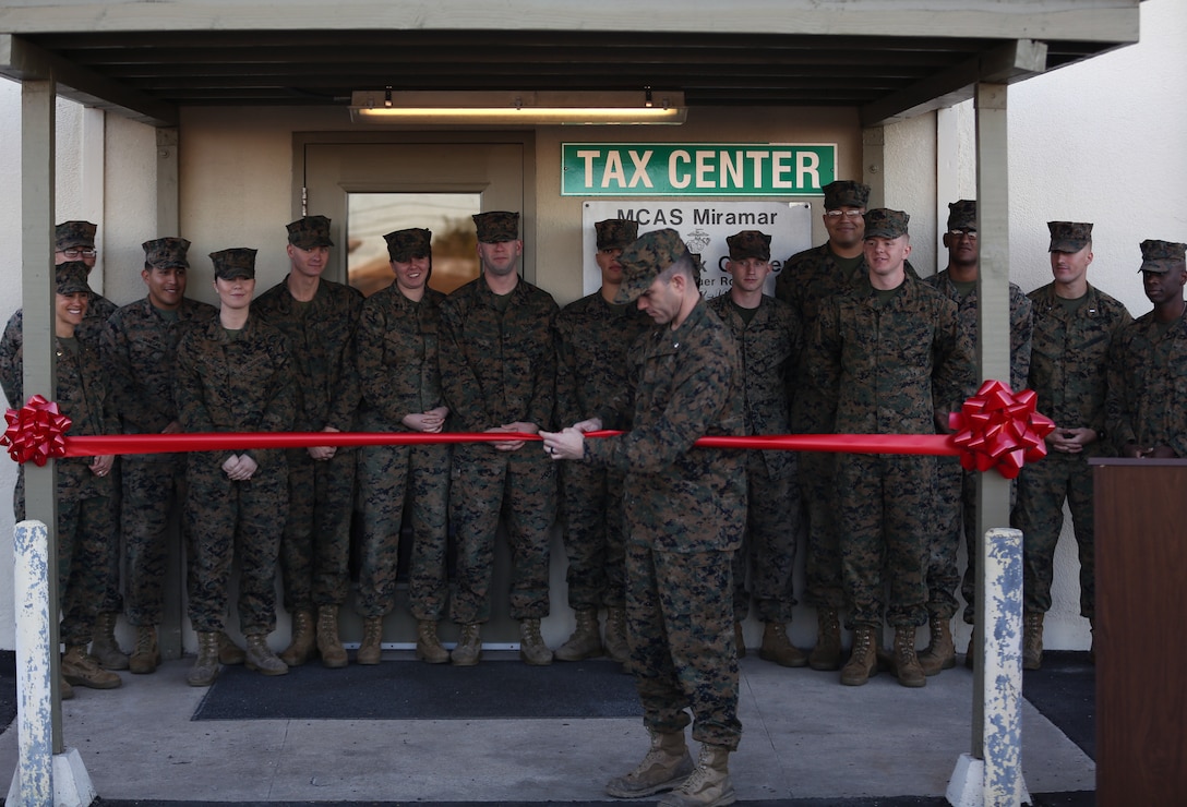 Lt. Col. Alan J. Clarke, commanding officer of Headquarters and Headquarters Squadron (HHS, cuts the ribbon signifying the grand opening for the tax center on Marine Corps Air Station Miramar, Calif., Jan. 22. The MCAS Miramar tax center will be open Monday through Thursday 8:00 A.M. to 3:00 P.M. and Fridays from 9:00 A.M. to 3:00 P.M. For more information please contact the tax center at 858-577-1040. (U.S. Marine Corps photo by Sgt. Jake McClung)