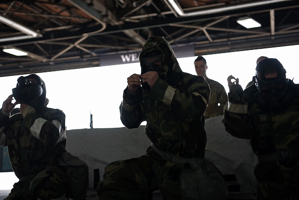 A load crew from the 20th Aircraft Maintenance Squadron, 79th Aircraft Maintenance Unit, don Mission-Oriented Protective Posture gear during a quarterly load crew competition at Shaw Air Force Base, S.C., Jan. 18, 2019.