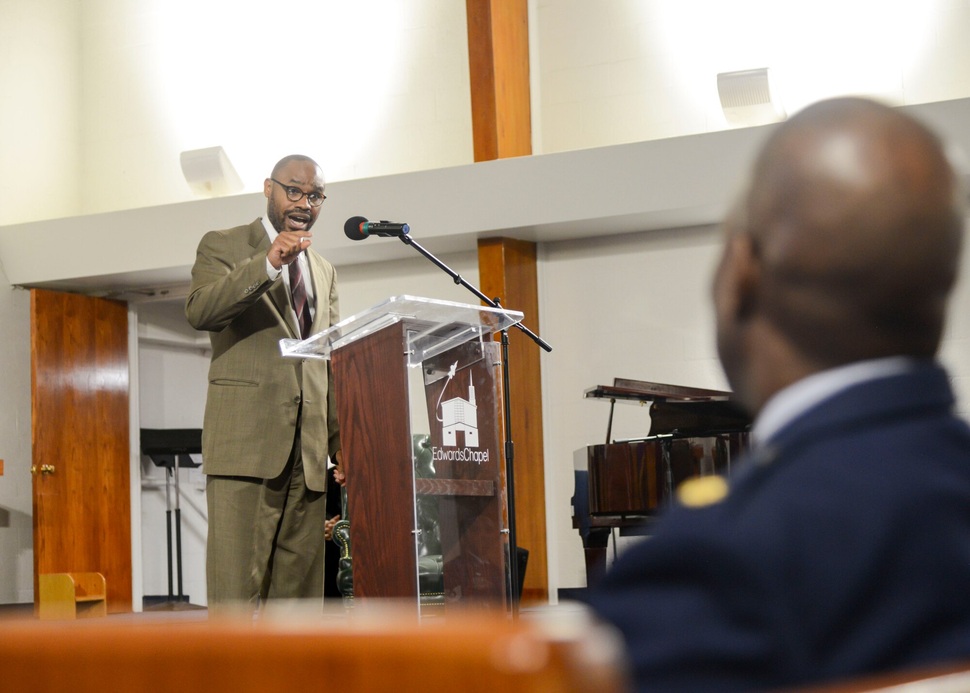 Guest speaker Dr. Maury Jackson speaks during the Dr. Martin Luther King Jr. Ceremony at Chapel 1 on Edwards Air Force Base, California, Jan. 17. Jackson is the chair of the Pastoral Studies Department and Associate Professor of Practical Theology for the HMS Richards Divinity School at La Sierra University in Riverside, California. (U.S. Air Force photo by Giancarlo Casem)