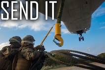 Landing support specialist attach an apex to an MV-22B Osprey hook during helicopter support team training at Camp Hansen, Okinawa, Japan, Jan. 14, 2019. Landing Support Company, 3rd Transportation Support Battalion, Combat Logistics Regiment 3, 3rd Marine Logistics Group supported Marine Medium Tiltrotor Squadron 265, Marine Aircraft Group 36, 1st Marine Aircraft Wing during external lift training, which ensures pilots and landing support specialists are able to communicate as well as transport gear from one location to another. (U.S. Marine Corps Photo by Cpl. André T. Peterson Jr.)