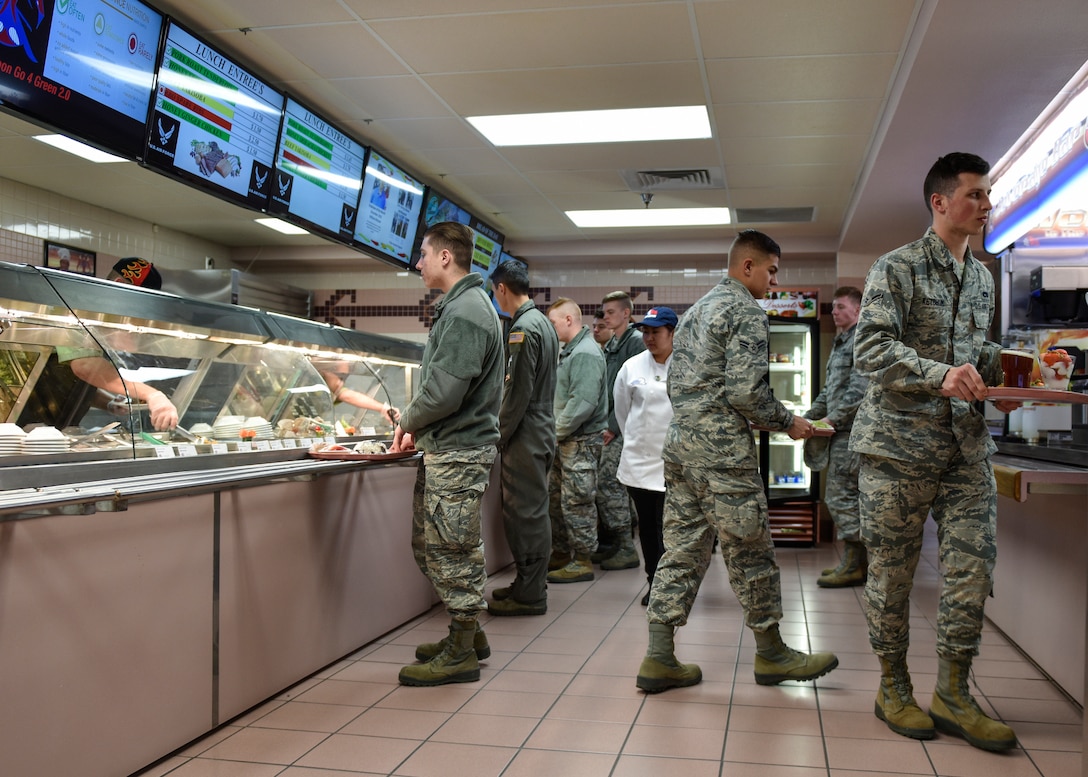 A Hennessy evaluator monitors a meal service at the Thunderbird Inn at Kirtland Air Force Base, N.M., Jan. 22, 2019. Kirtland's food service program is on of nine in the running for the Hennessy Trophy for best food service program in the Air Force. (U.S. Air Force photo by Airman 1st Class Austin J. Prisbrey)