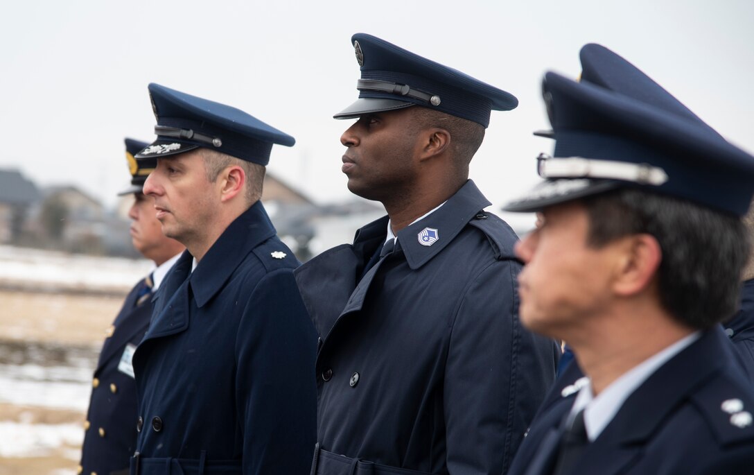 U.S. Air Force Lt. Col. David Dammeier, left, the 35th Civil Engineer Squadron commander, and Master Sgt. Damean Moore, a 35th CES fire chief, walk side-by-side during the annual Misawa City Fire Department New Year ceremony at Misawa City, Japan, Jan. 20, 2019. Team Misawa’s fire department units joined together to celebrate the New Year through a short fire demonstration, a parade and speeches, wishing all firefighters and their supporters a successful and prosperous year. During the events, local community members gathered to cheer on the dispatch teams. (U.S. Air Force photo by Senior Airman Sadie Colbert)