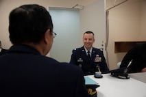 U.S Air Force Lt. Col. David Dammeier, the 35th Civil Engineer Squadron commander, talks with Koichiro Maita, Misawa City vice mayor, before giving speeches during the annual Misawa City Fire Department New Year ceremony at Misawa City, Japan, Jan. 20, 2019. The 35th CES leadership received an opportunity to greet Misawa City’s officials during tea time. Afterward, fire department committee members and leaders wished everyone a safe New Year. (U.S. Air Force photo by Senior Airman Sadie Colbert)