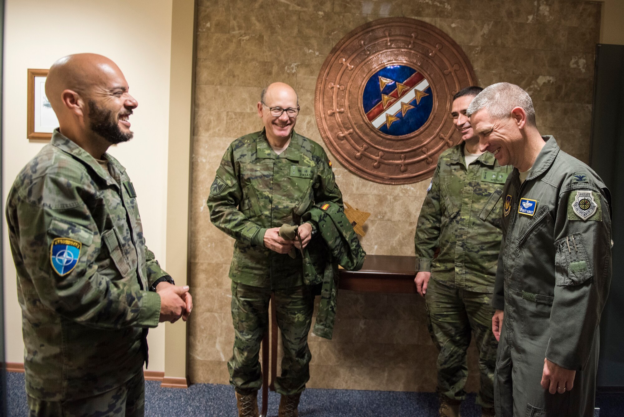 U.S. Air Force Col. Britt Hurst, 39th Air Base Wing commander, talks with leadership from the Spanish army at Incirlik Air Base, Turkey, Jan. 16, 2019.