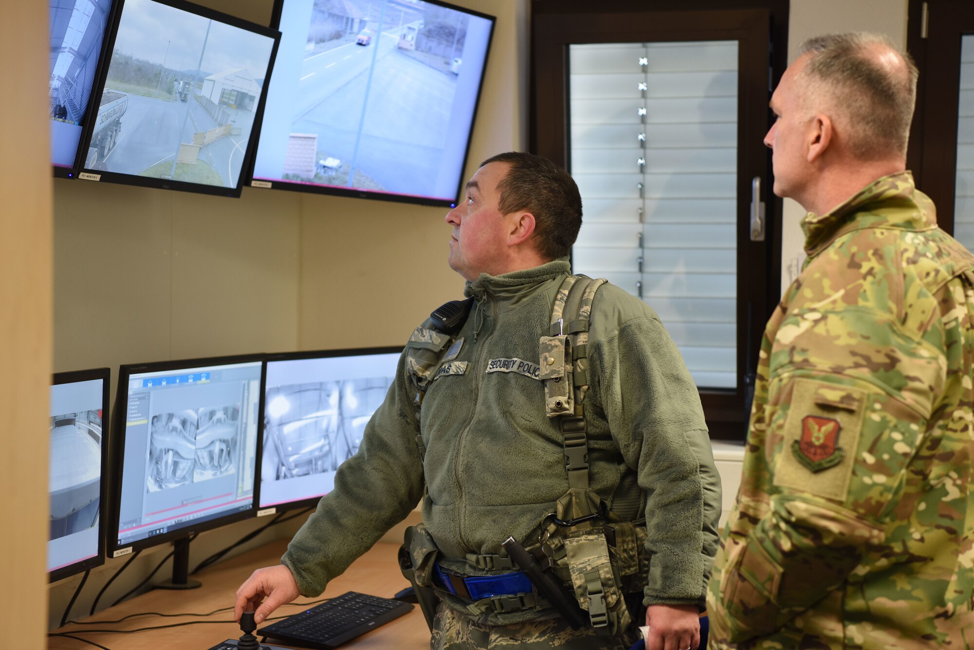 ZP5 Timo Joas, 86th Security Forces Squadron, chief of civilian police shows U.S. Air Force Col. Michael Miller, 2nd Bomb Wing, Barksdale AFB, Louisiana commander, the security capabilities of the commercial vehicle search facility on Ramstein Air Base, Germany, Jan. 15, 2019. Miller toured the facilities and learned about the German National civilian force that controls all of the inbound local commercial vehicle traffic.