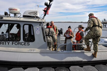 U.S. Air Force Expeditionary Center leadership boards a 27-foot SeaArk for a harbor security patrol boat tour Jan. 17, 2019, at Joint Base Charleston, S.C.