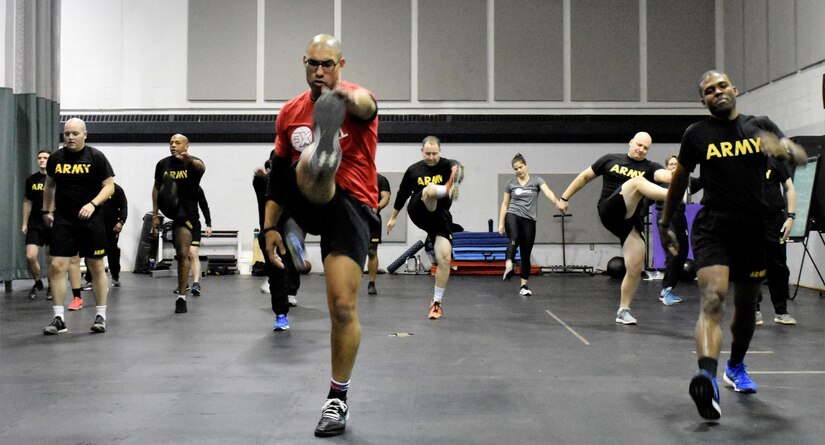 U.S. Army Soldiers assigned to the 629th Military Intelligence Battalion, National Guard, receive instruction on proper stretching and warm-up techniques in preparation of the Army Combat Fitness Test Jan. 14, 2019, at Camp Fretterd Military Reservation, Reisterstown, Md. Over the next six months, about 60 Soldiers from the MI battalion are incorporating a program known as 'Fit to Serve' into their military training and civilian life to improve overall mental and physical health.