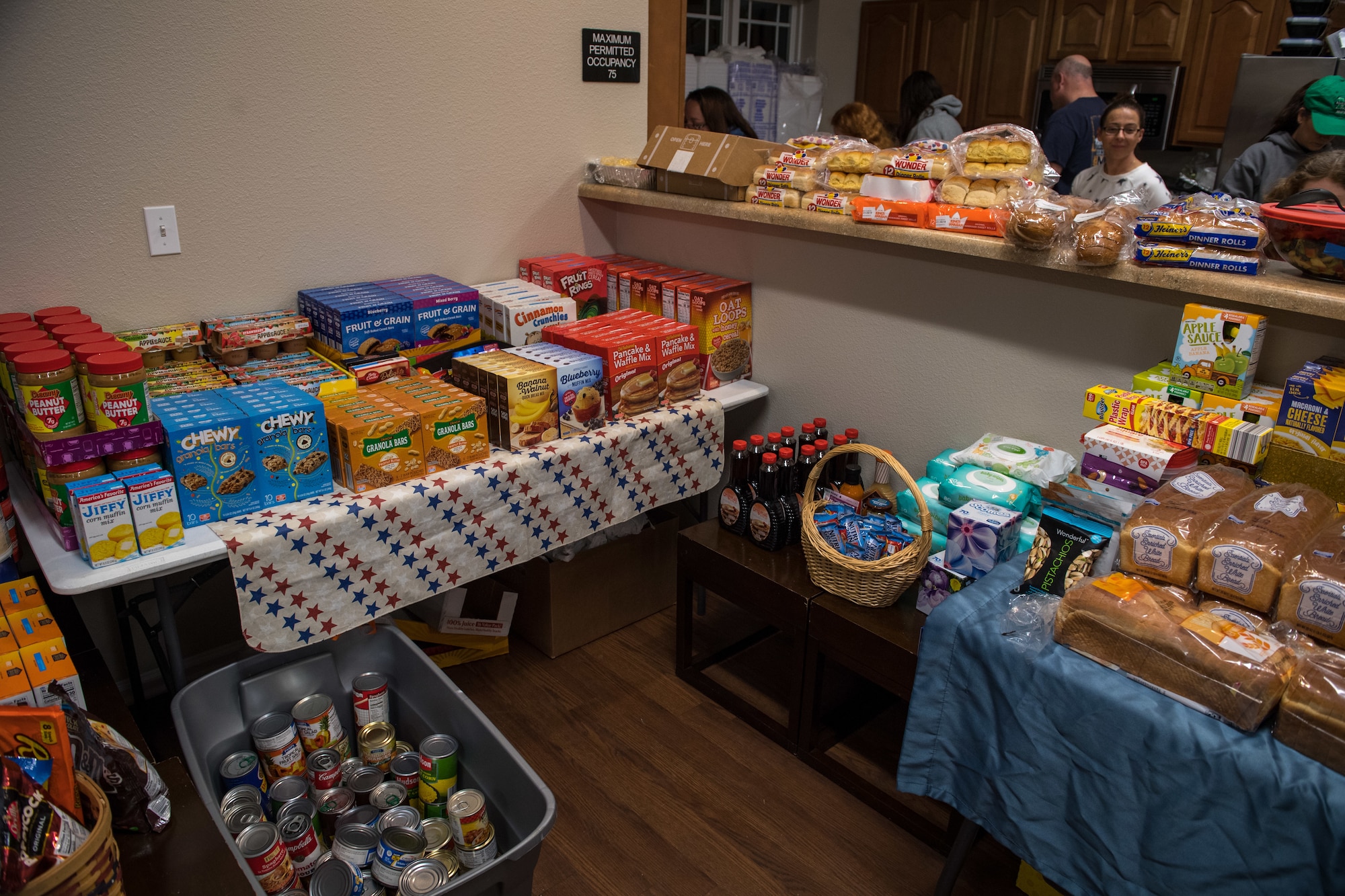 Pantry items are set out for U.S. Coast Guard members and their families to pick up at Jamestown Village, Yorktown, Virginia, Jan. 15, 2019.