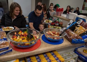 U.S. Coast Guard families line up to eat at Jamestown Village, Yorktown, Virginia, Jan. 15, 2019.