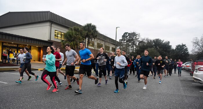 Team Charleston members take off from the starting line at the air base fitness center Jan. 18, 2019, during the annual Martin Luther King Jr. 5K run.