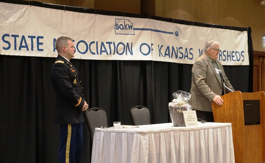The State Association of Kansas Watersheds held their 68th Annual Meeting in Topeka Jan. 22, 2019. which brought together the many water district representatives and some of their largest partners in federal, state and local government. Col. Doug Guttormsen, the Kansas City District commander, served as the keynote speaker. Jeremiah Hobbs, vice-president of SAKW, to the right provided the introduction.