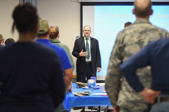 Judge Robert R. Lung demonstrates grounding techniques to cope with trauma during the combating trafficking in persons event Jan. 17, 2019, at Hill Air Force Base, Utah. Lung is the 18th District Judge in Douglas County, Colorado, and was appointed by the president to serve on the U.S. Advisory Council on Human Trafficking. (U.S. Air Force photo by Cynthia Griggs)