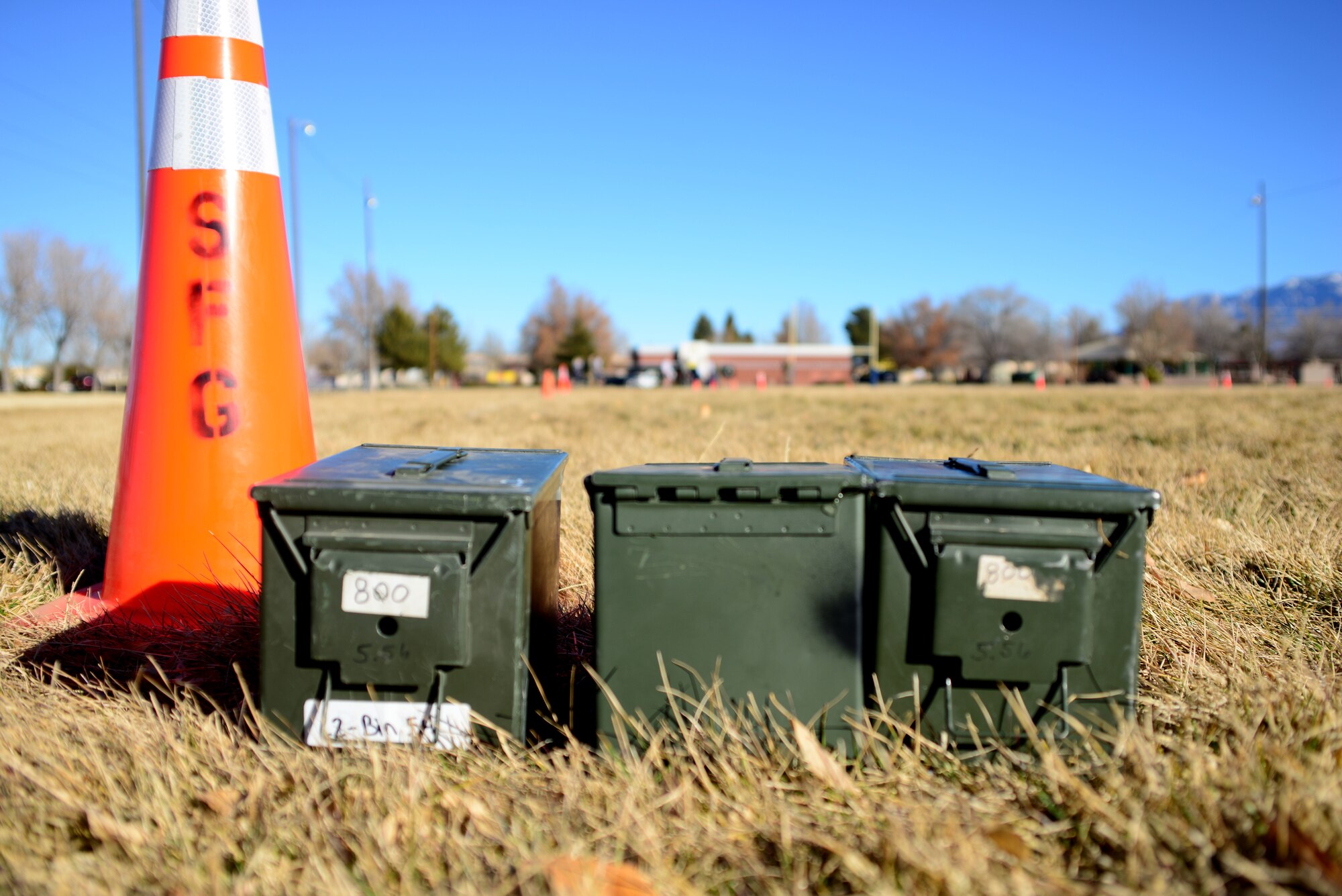 Ammunition cans on the ground