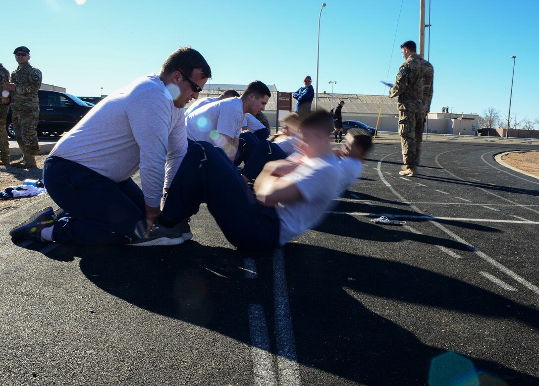 Airmen performing an Air Force Physical Training Test
