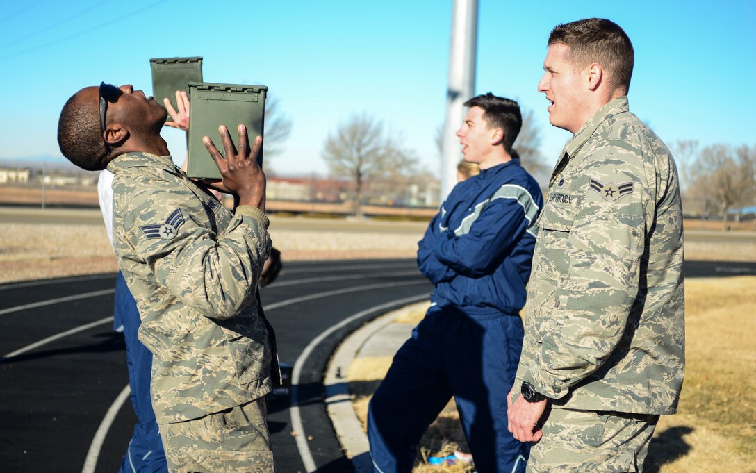 Airman lifts ammunition can