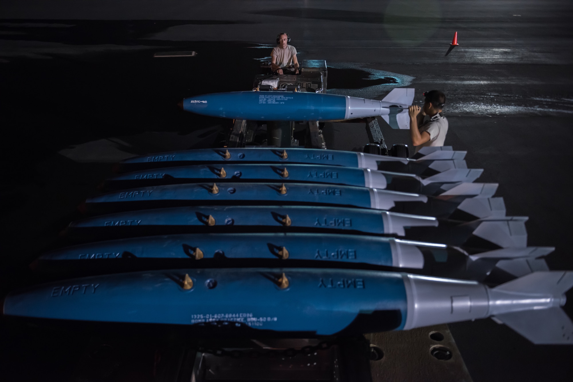 Senior Airman Michael C. Goodell, 509th Munitions Squadron weapons maintenance, prepares a B-2 Spirit bomber, deployed from Whiteman Air Force Base, Missouri, for a training mission at Joint Base Pearl Harbor-Hickam, Hawaii, Jan. 17, 2019.
