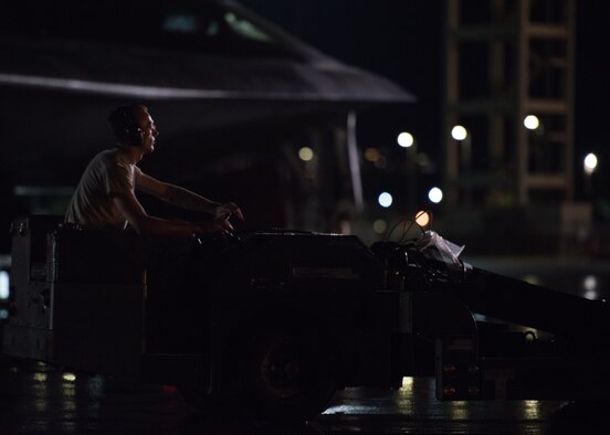 Senior Airman Michael C. Goodell, 509th Munitions Squadron weapons maintenance, deployed from Whiteman Air Force Base, Missouri, prepares inert munitions for a B-2 Spirit bomber training mission at Joint Base Pearl Harbor-Hickam, Hawaii, Jan. 17, 2019.