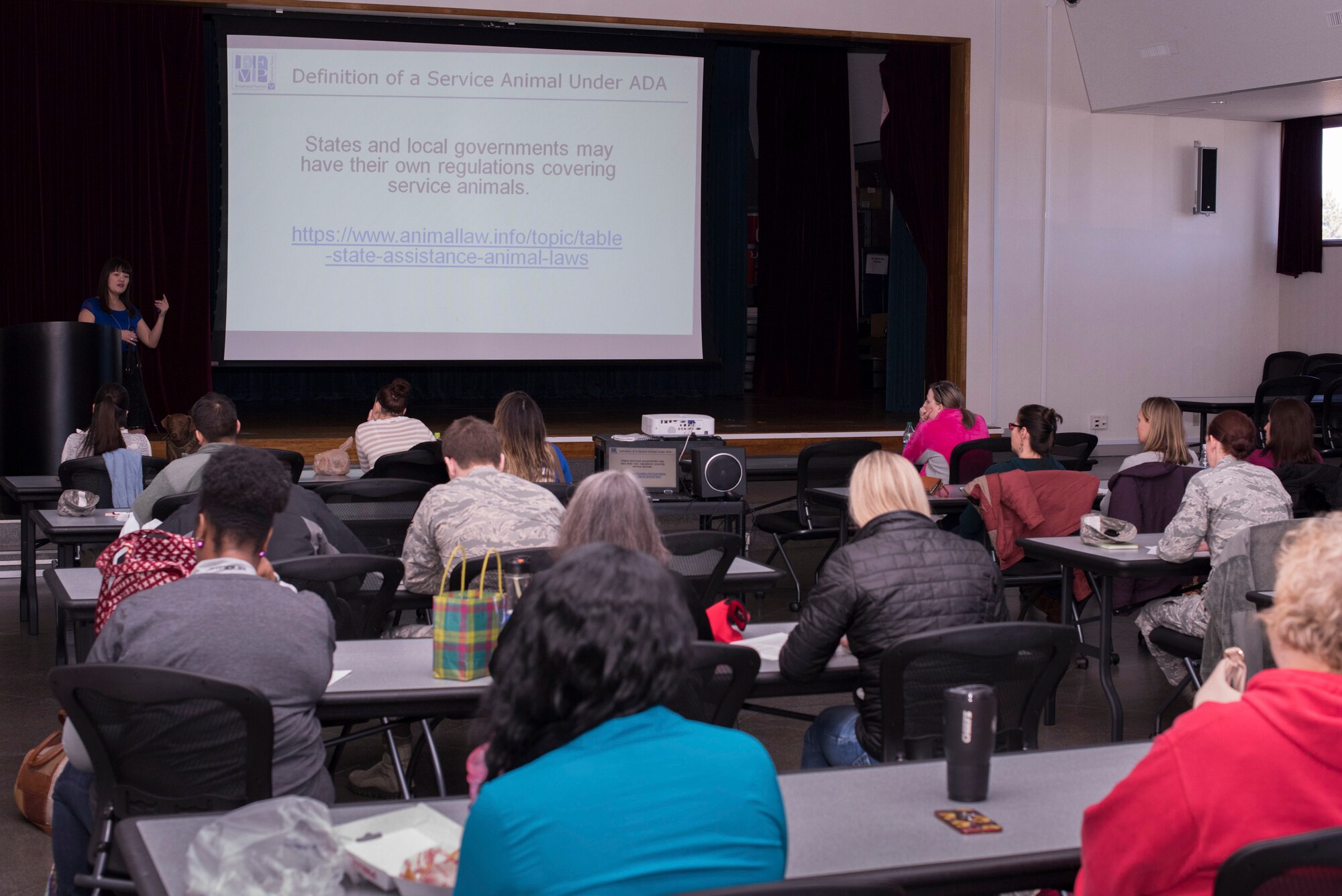 Jen Wong, 374th Force Support Squadron, Exceptional Family Member Program Family support coordinator, speaks to attendees at the assistance animal’s informational workshop at Yokota Air Base, Japan, Jan. 18, 2019.