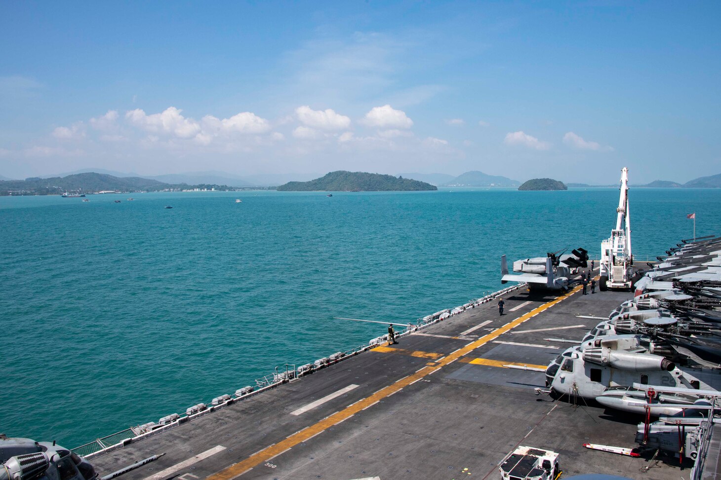 Wasp-class amphibious assault ship USS Essex (LHD 2) sets anchor off the coast of Phuket, Thailand while on a deployment of the Essex Amphibious Ready Group (ARG) and 13th Marine Expeditionary Unit (MEU). The Essex ARG/13th MEU is deployed to the U.S. 7th Fleet area of operation to support regional stability, reassure partners and allies and maintain a presence postured to respond to any crisis ranging from humanitarian assistance to contingency operations. (U.S. Navy photo by Mass Communication Specialist 2nd Class William Phillips/Released)