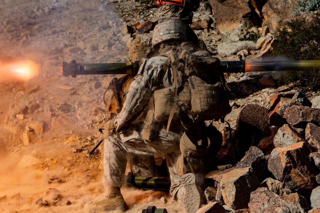 U.S. Marine Lance Cpl. Ruben Torres, an assaultmen squad leader, and Lance Cpl. Cameron H. Machado, an assaultmen gunner, both with Suicide Charley Company, 1st Battalion, 7th Marine Regiment, Marine Air-Ground Task Force-6 fire a Shoulder-Mounted Assault Weapon during Integrated Taining Exercise 2-19 on Range 410A aboard Marine Corps Air-Ground Combat Center Twentynine Palms, Calif., Jan. 22, 2019. ITX creates a challenging, realistic training environment that produces combat-ready forces capable of operating as an integrated MAGTF.