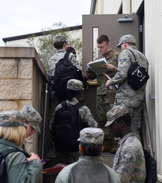 Airmen are in-processed for a pre-deployment function line exercise Jan. 23, 2019, at Joint Base Charleston, S.C.