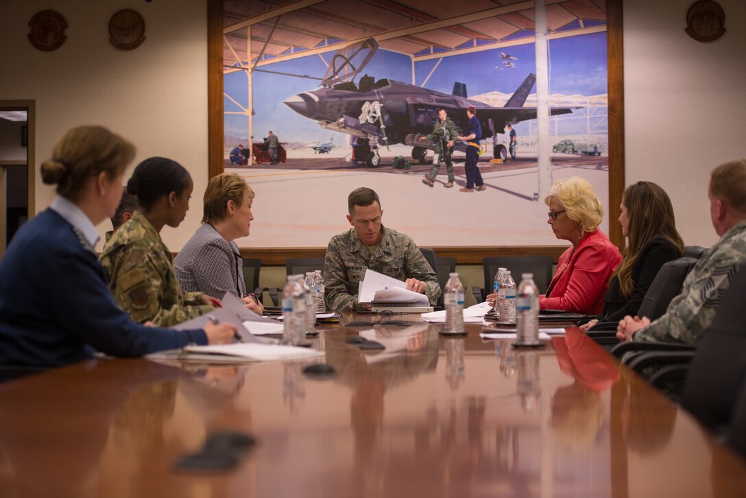 Col. Russell Williford, director of revitalizing squadrons task force, meets with his staff and members of the 56th Fighter Wing at Luke Air Force Base, Ariz., Jan. 17, 2019. The task force, in conjunction with a Royal Canadian Air Force (RCAF) Family Advocate representative, visited Luke to promote practices and identify improvements which need to be made in achieving squadron revitalization initiatives. (U.S. Air Force photo by Senior Airman Caleb Worpel)