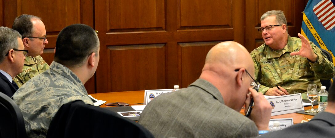 Army Brig. Gen. Mark Simerly, DLA Troop Support commander, right, briefs Air Force Maj. Gen. Lee Payne, DHA’s Combat Support Agency assistant director, left, during a visit Jan. 11, 2019 in Philadelphia.