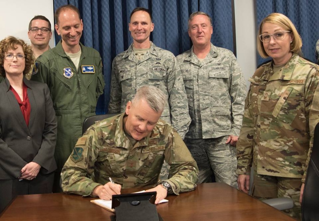 Maj. Gen. James A. Jacobson signs the newly released 2018-2023 Strategic Plan Jan. 23.