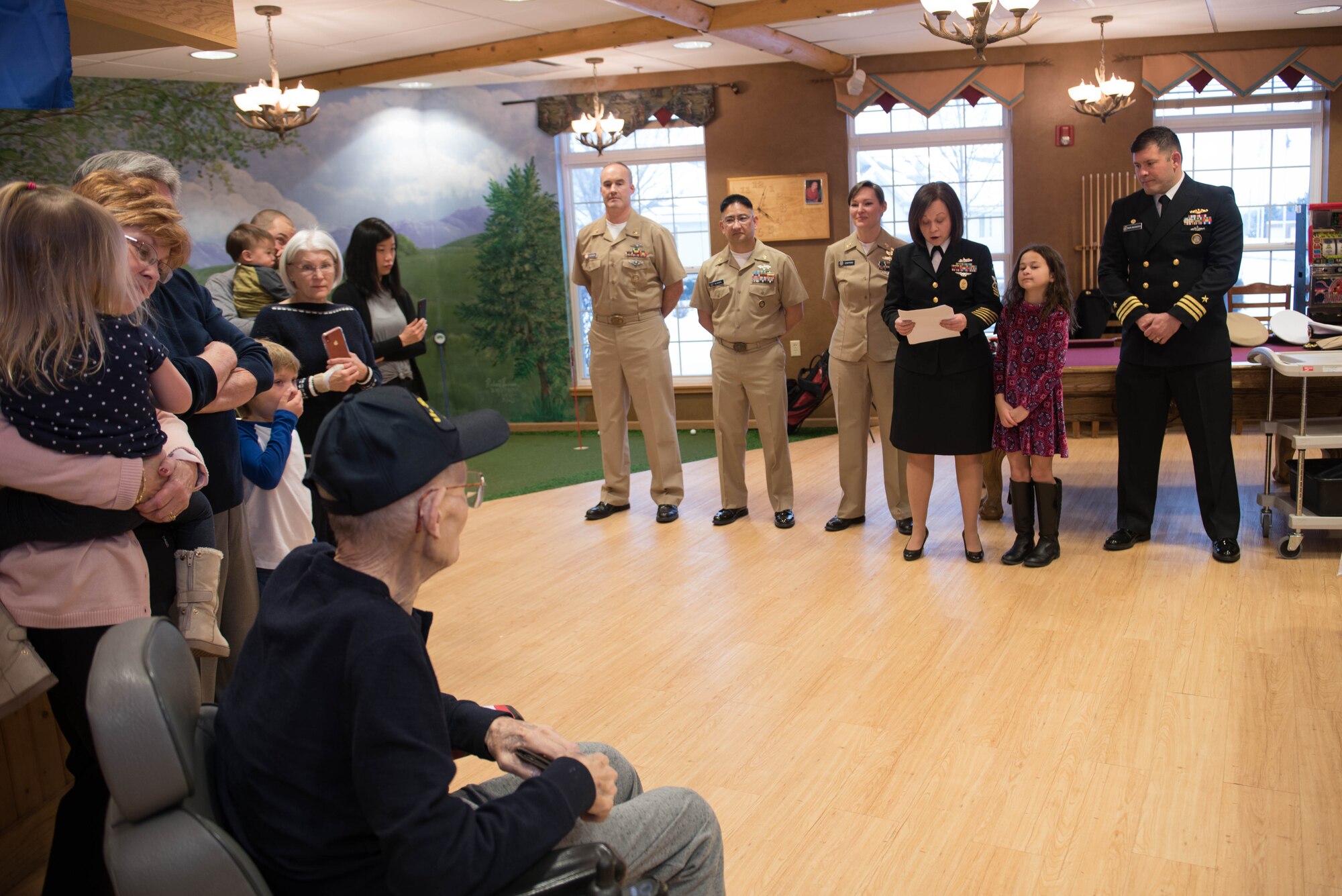 Senior Chief Petty Officer Lisa Vrtiska, U.S. Strategic Command Navy Element senior enlisted leader, thanks Navy veteran Chief Petty Officer Leonard Kulceski for his service during at a veteran recognition ceremony at Hillcrest Mable Rose in Papillion, Nebraska, Jan. 18, 2019. During the ceremony, Kulceski was presented a certificate, pin, blanket and a salute from chief petty officers to honor his service to his country. (U.S. Air Force photo by Zachary Hada)