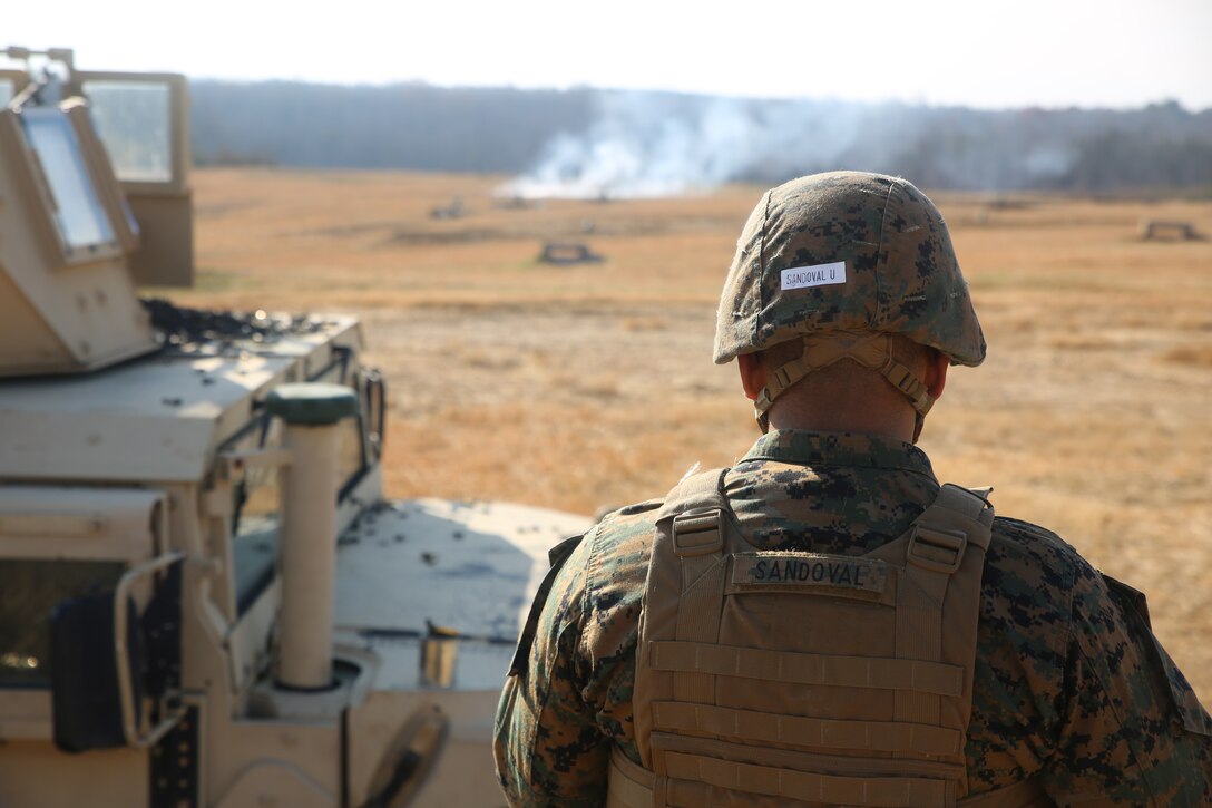 Corporal Uveimar Sandoval stands down range at Marine Base Quantico, Va., Dec. 13, 2018. The exercise provided Marines an opprutunity to conduct convoy familiarzations and concluded with an M-240B live fire.