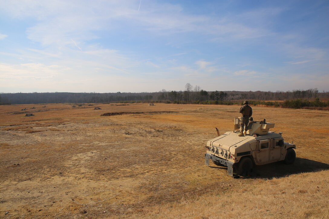 Marine with Motor Transportation Platoon stares down range at Marine Base Quantico, Va., Dec. 13, 2018. The exercise provided Marines an opprutunity to conduct convoy familiarzations and concluded with an M-240B live fire.