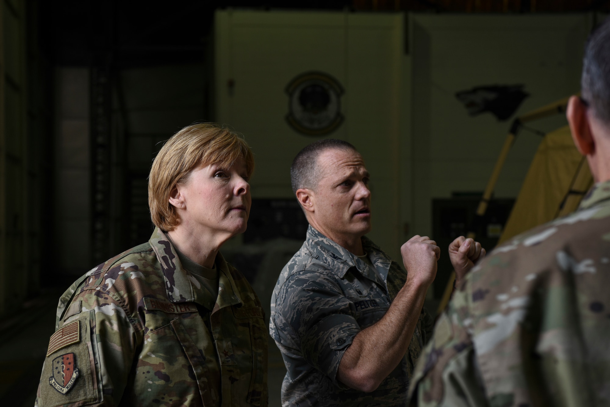 U.S. Air Force Col. Robert Peltzer, 8th Medical Group commander, briefs Brig. Gen. (Dr.) Sharon Bannister, Defense Health Agency education and training deputy assistant director and Assistant Surgeon General for Dental Services, during her visit to Kunsan Air Base, Republic of Korea, Jan. 23, 2019. Gen. Bannister toured the 8th MDG sharing her priorities and learning how the Wolf Pack ensures force readiness. (U.S. Air Force Photo by Senior Airman Savannah Waters)