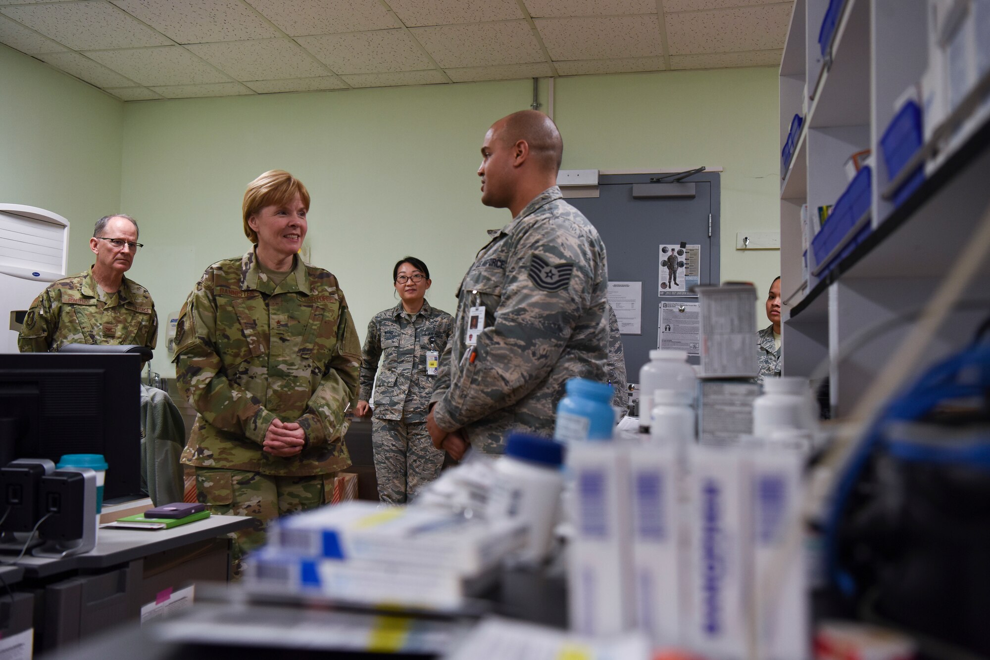 U.S. Air Force Tech. Sgt. Defabian Johnson, 8th Medical Group pharmacy services noncommissioned officer in charge, briefs Brig. Gen. (Dr.) Sharon Bannister, Defense Health Agency education and training deputy assistant director and Assistant Surgeon General for Dental Services, during her visit to Kunsan Air Base, Republic of Korea, Jan. 23, 2019. The Air Force Dental Service mission is to provide innovative, expeditionary Airmen to support global operations and ensure a dentally fit force through Trusted Care, and its readiness contributions are critical to Total Force Full Spectrum Readiness. (U.S. Air Force Photo by Senior Airman Savannah Waters)