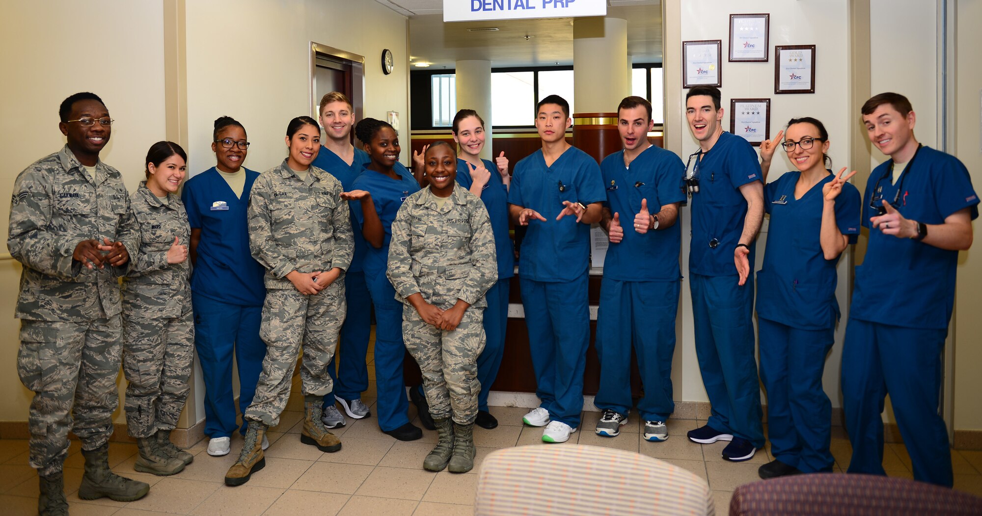 Airmen from the 31st Dental Squadron pose for a group photo at Aviano Air Base, Italy, Jan. 22, 2019. The dental squadron held a Dental Give Back day on Jan. 12 to benefit retirees and dependents. (U.S. Air Force photo by Airman 1st Class Caleb House)
