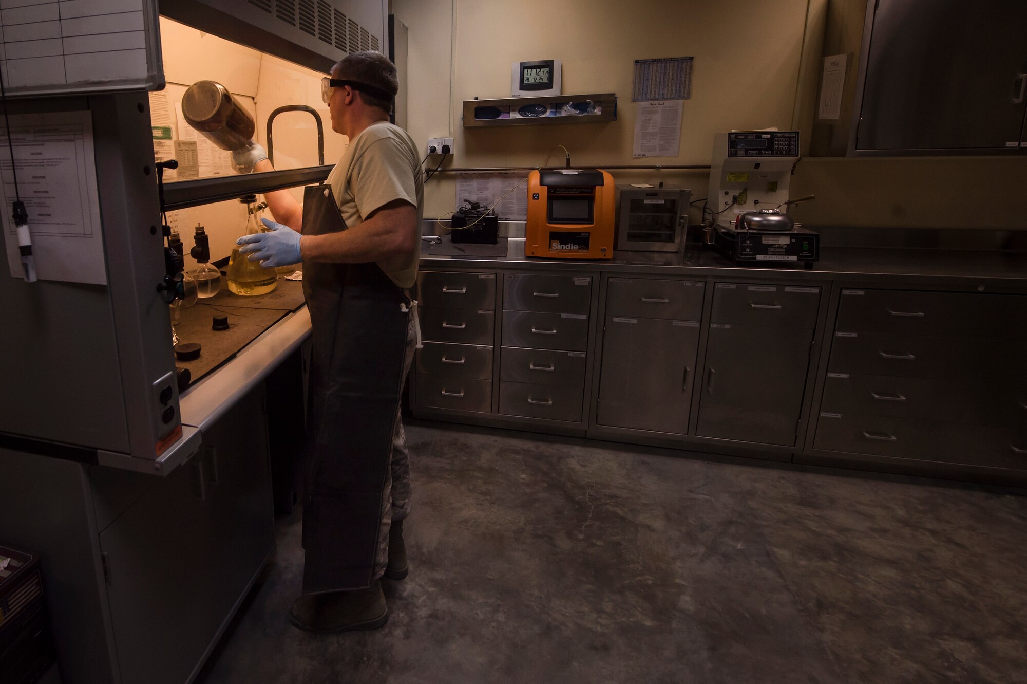 Tech. Sgt. Steven Jenkins, 379th Expeditionary Logistics Readiness Squadron (ELRS) fuels lab NCO in charge, performs a ‘bottle method’ during fuel testing Jan. 24, 2019, at Al Udeid Air Base, Qatar As part of his job, Jenkins analyzes various fuel types including gasoline, diesel fuel and Jet Propellant 8, to ensure they are free of contaminants before use in aircraft and vehicles. Airmen from the 379th ELRS fuel lab retrieve samples for testing from various sources including pipelines, trucks and fuel tanks.   (U.S. Air Force photo by Tech. Sgt. Christopher Hubenthal) (U.S. Air Force photo by Tech. Sgt. Christopher Hubenthal)