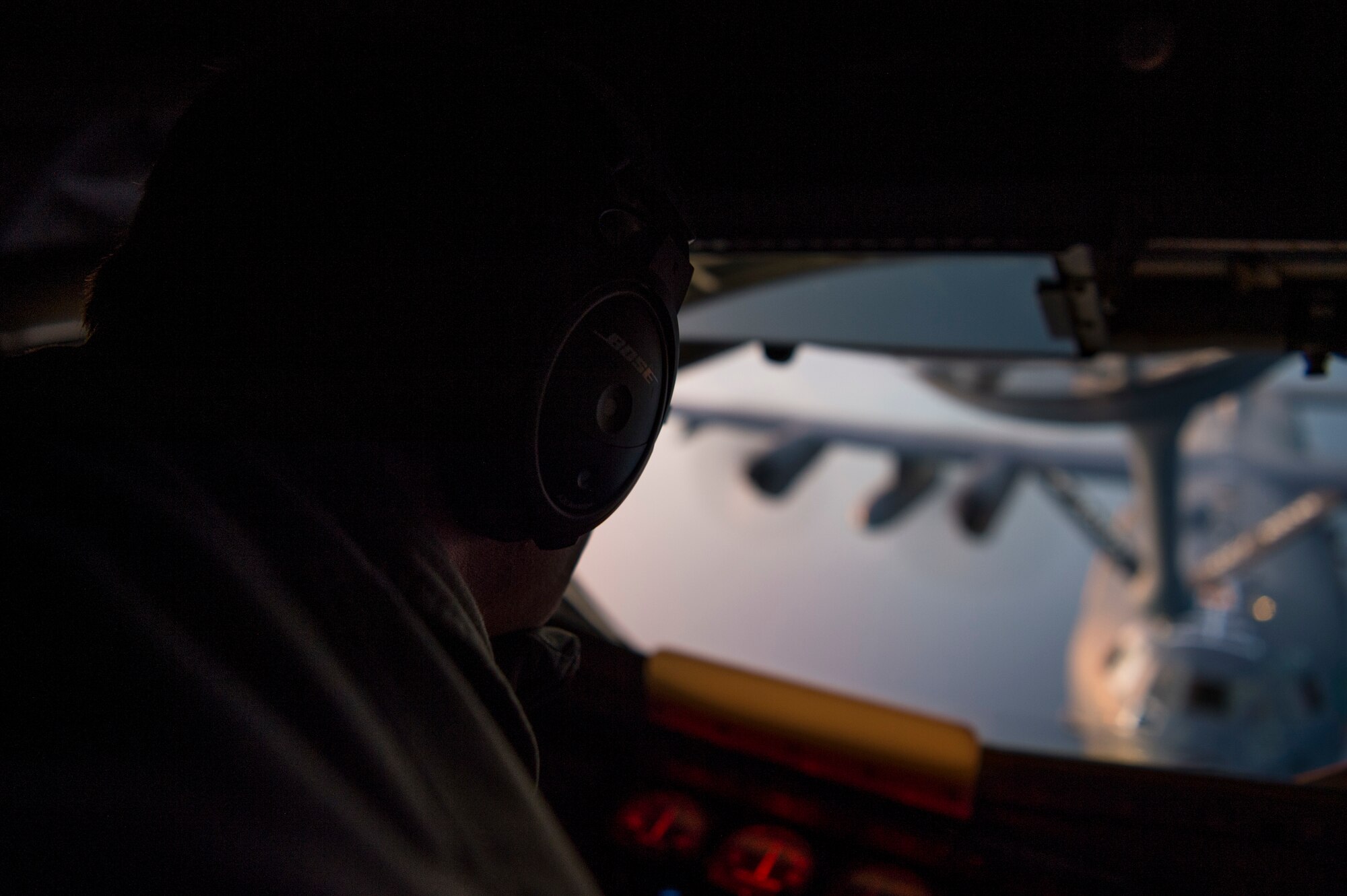 U.S. Air Force Staff Sgt. Jeffrey Michal, a 50th Air Refueling Squadron boom operator, refuels an MC-130H Combat Talon II aircraft over the Gulf of Mexico in support of Exercise Emerald Warrior, Jan. 17, 2019.